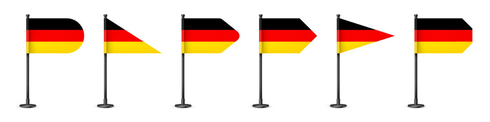 Realistic various German table flags on a black steel pole. Souvenir from Germany. Desk flag made of paper or fabric, shiny metal stand. Mockup for promotion and advertising. Vector illustration
