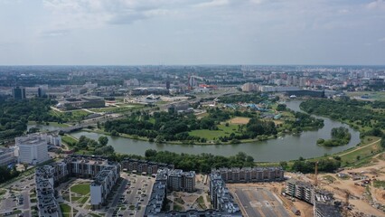 Minsk, Belarus - 01.08.2022: Aerial view of the Svisloch River, on which stands Minsk, the capital of Belarus. Panorama of the center of Minsk. Palace of Independence in Minsk. Presidential palace.