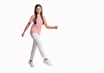 Fototapeta na wymiar fashion style of teen girl walking in tshirt. teen style of pretty girl. teen girl style