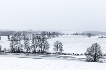 Fototapeta na wymiar Panorama of misty winter landscape.