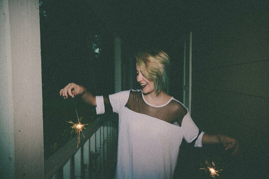 blue hair girl with sparklers