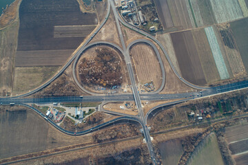 Aerial view asphalt road and green forest, Forest road going through forest with car adventure view from above, Ecosystem and ecology healthy environment concepts and background.