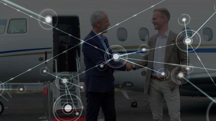 Animation of network of connections over diverse business people at airport - Powered by Adobe