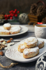 Ricciarelli,  gluten free almond cookies. Italian traditional Christmas cookies and coffee. New year decoration