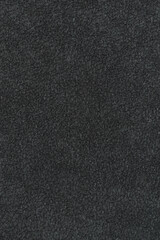 The texture and background of the upholstery fabric is dark gray. Velour fabric sample texture as background and design element. Fabric texture for sofa