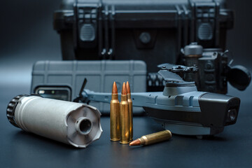 Reconnaissance radio controlled nano drone, assault rifle ammo and ar15 silencer.