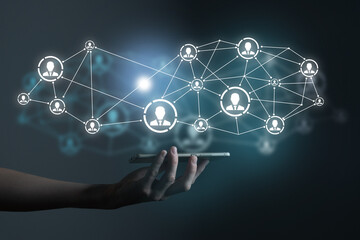 Human resources manager pointing at virtual network chain with person icons. Human capital and...