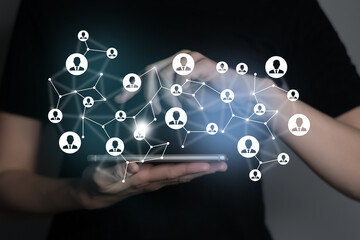 . Virtual visualization of network chain with person icons, female unrecognised manager on background. Human capital and teambuilding concept.