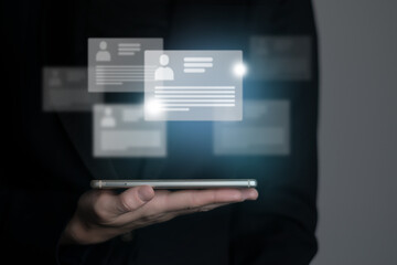  Managers`s hand pointing on highlighted cv cards with candidates information. Human resources concept.Illustrative material for articles and web.