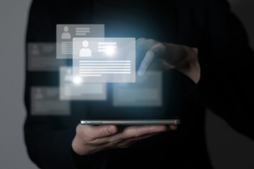  Managers`s hand pointing on highlighted cv cards with candidates information. Human resources concept.Illustrative material for articles and web.