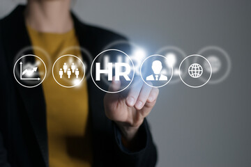 Human resource manager looking at many different recruitment icons. Human resources concept. Illustrative material for articles and web.