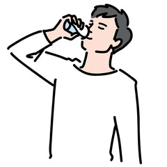 水を飲んでいる若い男性
