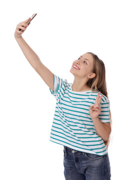 Teenage girl taking selfie on white background