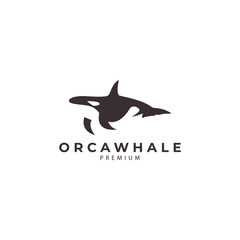 silhouette of orca whale sea mammal swimming ocean logo design vector icon illustration