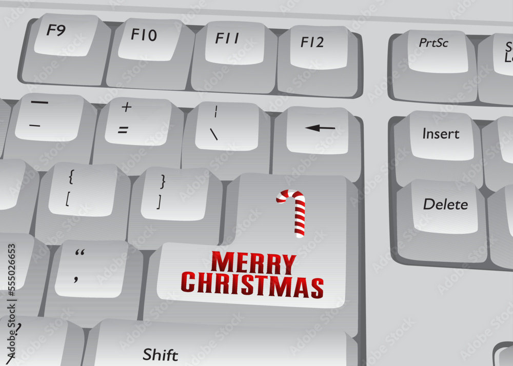 Poster computer keyboard with merry christmas text. close-up of an electronic computer device part, keypad.