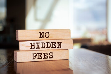 Wooden blocks with words 'No Hidden Fees'.