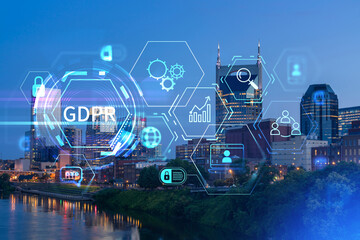 Panoramic view of Broadway district of Nashville over Cumberland River at illuminated night skyline, Tennessee, USA. GDPR hologram, concept of data protection regulation and privacy for individuals