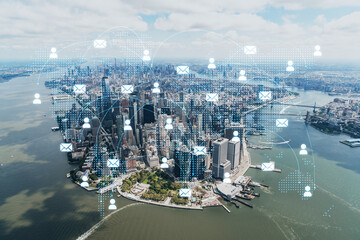 Aerial panoramic helicopter city view on Lower Manhattan district and financial Downtown, New York, USA. Social media hologram. Concept of networking and establishing new people connections