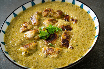 Afghani chicken in green curry or Hariyali tikka chicken hara masala