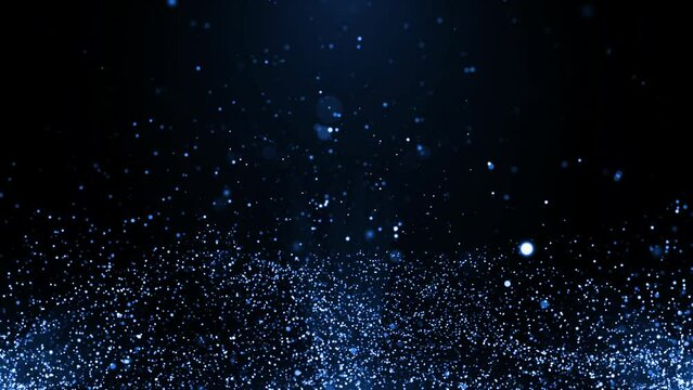 Beautiful Blue shimmering particles with lens flare on black background Loop