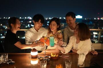 Let's celebrate for seasonal party such as Christmas, New year, Birthday or Anniversary. Happiness with a group of friends with a glass of cocktail