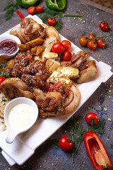 meat chicken platter, wings, baked chicken dish for the company