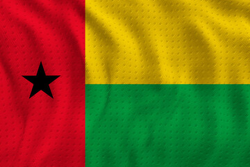 National flag of Guinea-Bissau.  Background  with flag of Guinea-Bissau.