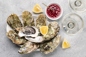 Fresh oysters with glasses of sparkling wine