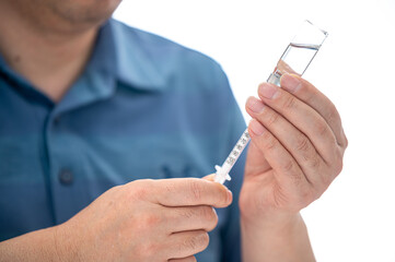 Male Diabetic Injecting Themselves With Insulin