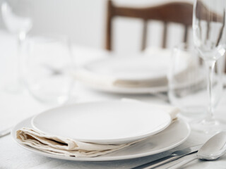 Beautiful table setting in white colors