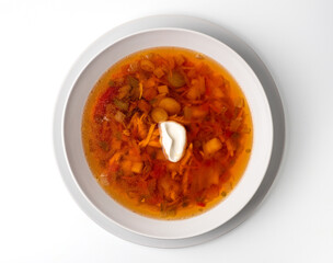 Red-beet soup with chicken, isolated