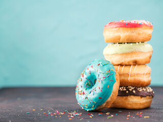 Stack of assorted donuts, copy space