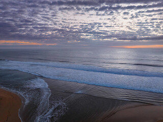 Beautiful sunrise with clouds over the ocean