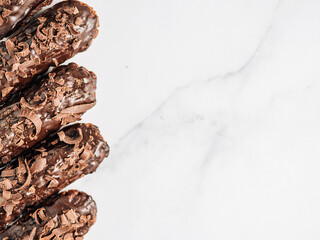Healthy chocolate eclairs, copy space right