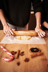 Christmas cookies. Making gingerbread cookies for Holidays. Gingerbread dough. Christmas Baking background. Form for cutting gingerbread. Merry Christmas and Happy Holidays.