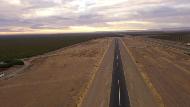 Small airplane landing strip in Central California next to Highway 5 near Coalinga