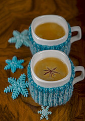 coffee with cardamom. winter drink. Coffee in cups with cardamom and white sugar on vintage wooden background