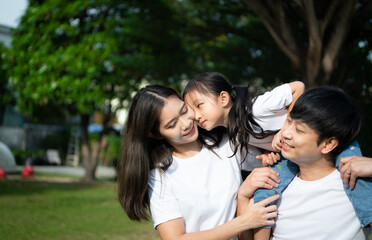 Obraz premium Vacation for a young family Spend this priceless time together playing on the village lawn.