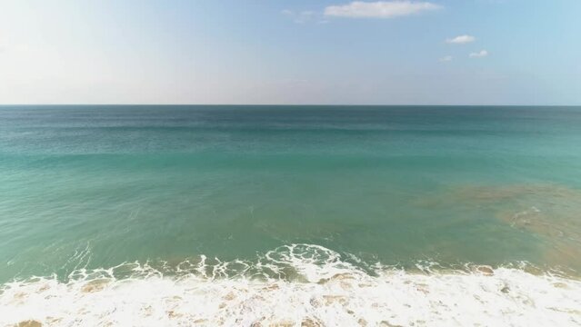 Aerial view over vast sea and horizon on Spanish beach in Los Canos de Meca