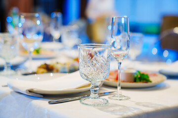 empty wine glasses on the table. tableware for the banquet. 