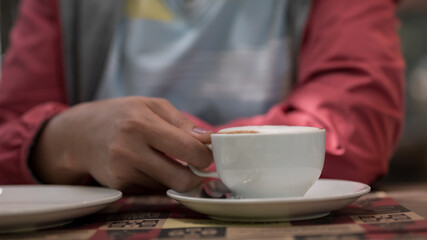 Close up coffee cup in the coffee shop