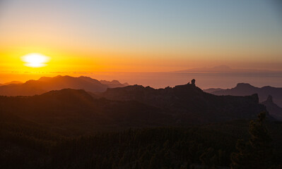 Nature and landscape of the Gran Canaria. Mirador Roque Nublo . mountains over the sunset and views of Tenerife.
