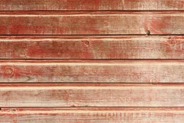 Wooden red planks with texture of a natural tree. A hardwood aged wall background.