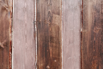 Wooden red planks with texture of a natural tree. A hardwood aged wall background.