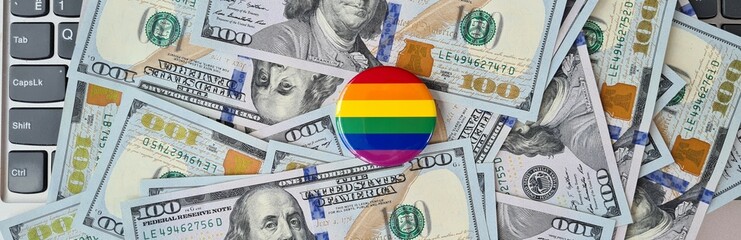 LGBT pride flag for gay community money on keyboard
