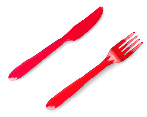 colored plastic fork and knife isolated on white background.