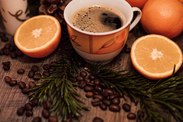 Christmas composition coffee beans, orange, wine, candle. New Year's table