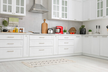 Beautiful kitchen interior with stylish modern furniture