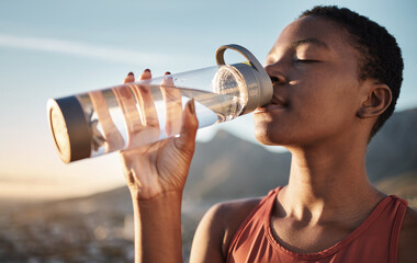 Fitness, black woman and drinking water bottle after training workout, exercise and outdoor cardio...