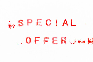 Red color ink rubber stamp in word special offer on white paper background